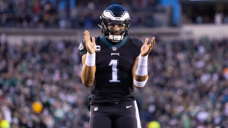 Jan 8, 2023; Philadelphia, Pennsylvania, USA; Philadelphia Eagles quarterback Jalen Hurts (1) reacts to a touchdown against the New York Giants during the first quarter at Lincoln Financial Field. Mandatory Credit: Bill Streicher-USA TODAY Sports