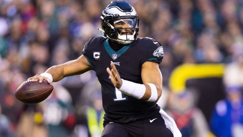 Jan 8, 2023; Philadelphia, Pennsylvania, USA; Philadelphia Eagles quarterback Jalen Hurts (1) passes the ball against the New York Giants during the first quarter at Lincoln Financial Field. Mandatory Credit: Bill Streicher-USA TODAY Sports