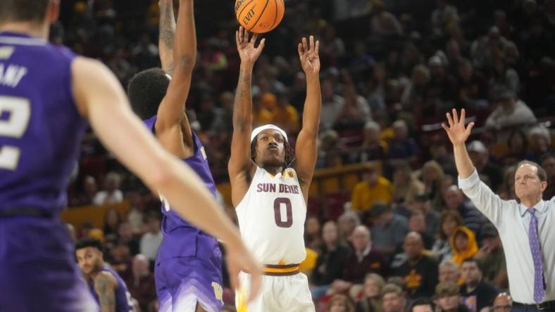 Jan 8, 2023; Tempe, Arizona, USA; Arizona State Sun Devils guard DJ Horne (0) shoots the ball against the Washington Huskies at Desert Financial Arena.

Basketball Wash Asu Mbb Washington At Arizona State