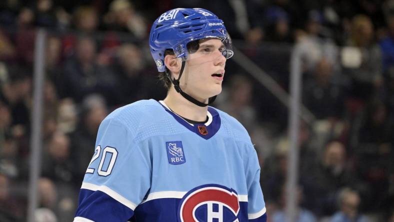 Jan 9, 2023; Montreal, Quebec, CAN; Montreal Canadiens forward Juraj Slafkovsky (20) prepares for a face off against the Seattle Kraken during the second period at the Bell Centre. Mandatory Credit: Eric Bolte-USA TODAY Sports