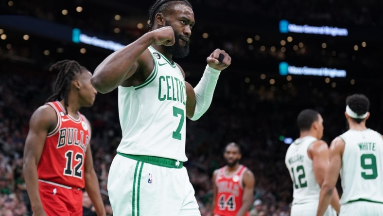 Jan 9, 2023; Boston, Massachusetts, USA; Boston Celtics guard Jaylen Brown (7) reacts after a basket by forward Grant Williams (12) against the Chicago Bulls in the second half at TD Garden. Mandatory Credit: David Butler II-USA TODAY Sports