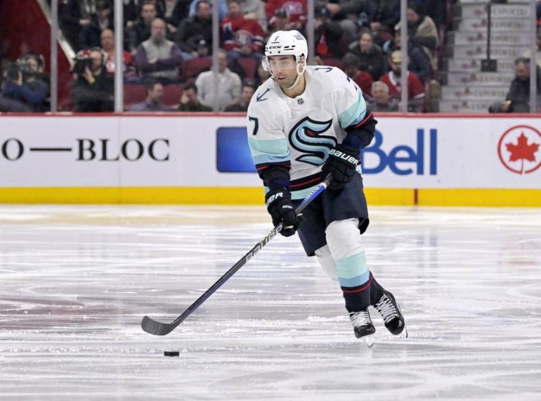 Jan 9, 2023; Montreal, Quebec, CAN; Seattle Kraken forward Jordan Eberle (7) plays the puck during the third period of the game against the Montreal Canadiens at the Bell Centre. Mandatory Credit: Eric Bolte-USA TODAY Sports