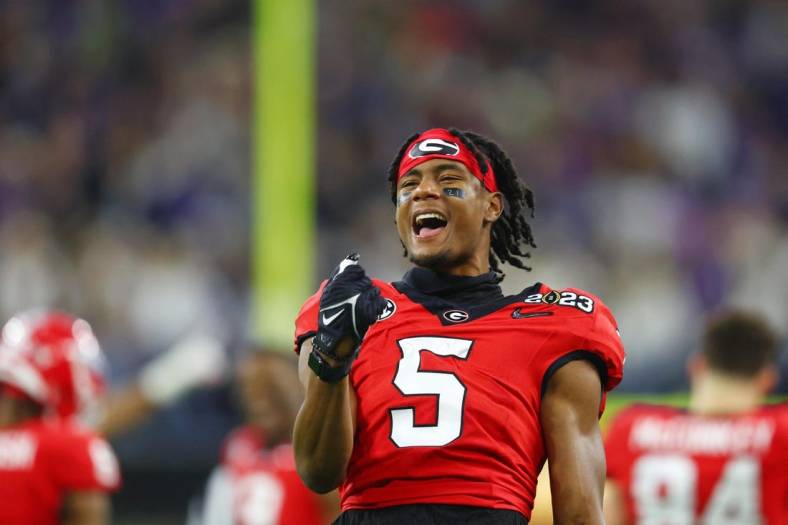 Jan 9, 2023; Inglewood, CA, USA; Georgia Bulldogs wide receiver Adonai Mitchell (5) reacts after a play against the TCU Horned Frogs during the third quarter of the CFP national championship game at SoFi Stadium. Mandatory Credit: Mark J. Rebilas-USA TODAY Sports