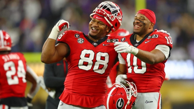 Jan 9, 2023; Inglewood, CA, USA; Georgia Bulldogs defensive lineman Jalen Carter (88) and linebacker Jamon Dumas-Johnson (10) react after a play against the TCU Horned Frogs during the fourth quarter of the CFP national championship game at SoFi Stadium. Mandatory Credit: Mark J. Rebilas-USA TODAY Sports