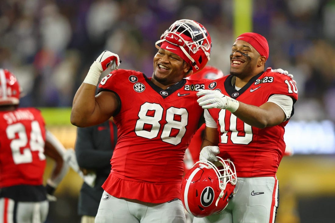 Jan 9, 2023; Inglewood, CA, USA; Georgia Bulldogs defensive lineman Jalen Carter (88) and linebacker Jamon Dumas-Johnson (10) react after a play against the TCU Horned Frogs during the fourth quarter of the CFP national championship game at SoFi Stadium. Mandatory Credit: Mark J. Rebilas-USA TODAY Sports