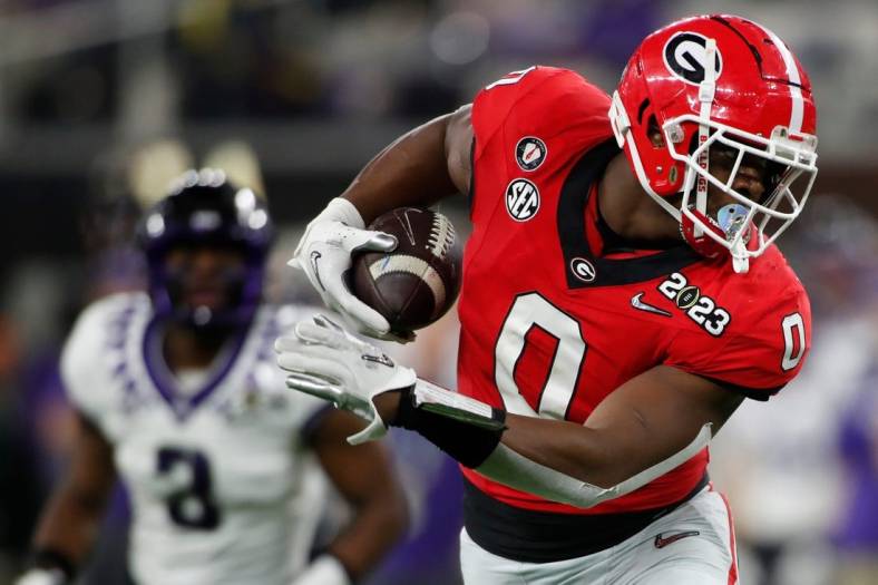 Georgia tight end Darnell Washington (0) makes a catch during the second half of the NCAA College Football National Championship game between TCU and Georgia on Monday, Jan. 9, 2023, in Inglewood, Calif.

News Joshua L Jones