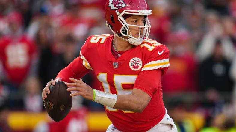 Jan 1, 2023; Kansas City, Missouri, USA; Kansas City Chiefs quarterback Patrick Mahomes (15) throws a pass during the second half against the Denver Broncos at GEHA Field at Arrowhead Stadium. Mandatory Credit: Jay Biggerstaff-USA TODAY Sports