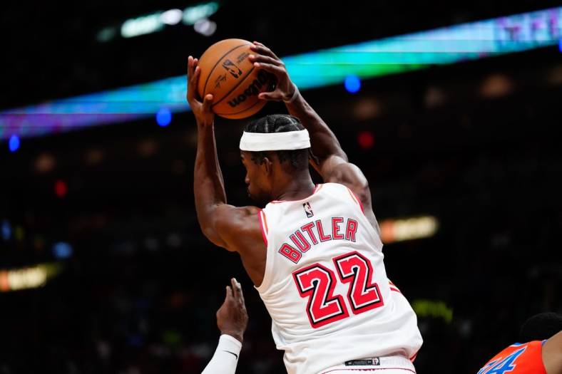 Jan 10, 2023; Miami, Florida, USA; Miami Heat forward Jimmy Butler (22) catches a round against the Oklahoma City Thunder during the second half at FTX Arena. Mandatory Credit: Rich Storry-USA TODAY Sports