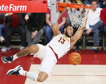 Iowa State University Cyclones guard Jaren Holmes (13) hangs out the rim after a dunk against Texas Tech Red Raiders during the second half at Hilton Coliseum Tuesday, Jan 10, 2023, in Ames, Iowa.  Photo by Nirmalendu Majumdar/Ames Tribune

Trxas Tech And Iowa State Men S Basketball
