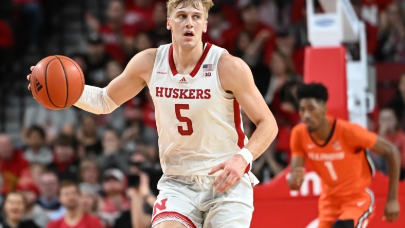 Jan 10, 2023; Lincoln, Nebraska, USA;  Nebraska Cornhuskers guard Sam Griesel (5) dribbles up court against the Illinois Fighting Illini in the first half at Pinnacle Bank Arena. Mandatory Credit: Steven Branscombe-USA TODAY Sports