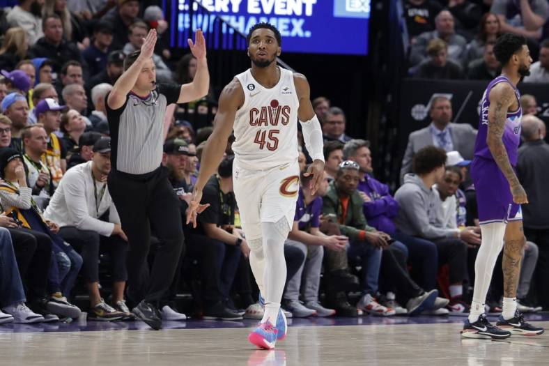 Jan 10, 2023; Salt Lake City, Utah, USA;  Cleveland Cavaliers guard Donovan Mitchell (45) celebrates after scoring a three point basket against the Utah Jazz during the fourth quarter at Vivint Arena. Mandatory Credit: Chris Nicoll-USA TODAY Sports
