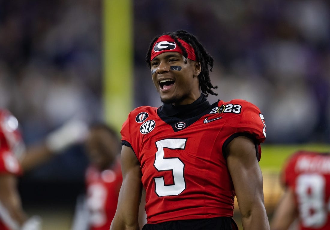 Jan 9, 2023; Inglewood, CA, USA; Georgia Bulldogs wide receiver Adonai Mitchell (5) celebrates against the TCU Horned Frogs during the CFP national championship game at SoFi Stadium. Mandatory Credit: Mark J. Rebilas-USA TODAY Sports