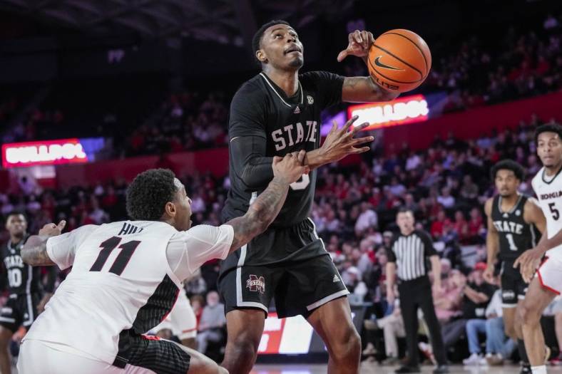Jan 11, 2023; Athens, Georgia, USA; Mississippi State Bulldogs forward D.J. Jeffries (0) is fouled by Georgia Bulldogs guard Justin Hill (11) during the first half at Stegeman Coliseum. Mandatory Credit: Dale Zanine-USA TODAY Sports