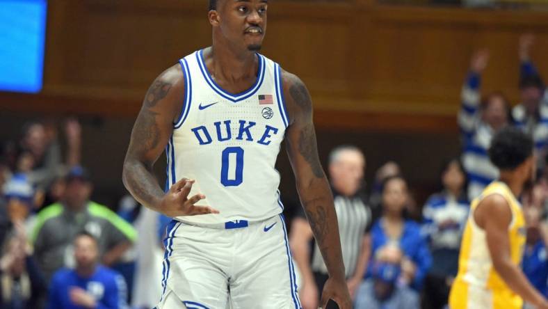 Jan 11, 2023; Durham, North Carolina, USA; Duke Blue Devils forward Dariq Whitehead(0) reacts after hitting a three-pointer during the first half against the Pittsburgh Panthers at Cameron Indoor Stadium. Mandatory Credit: Rob Kinnan-USA TODAY Sports