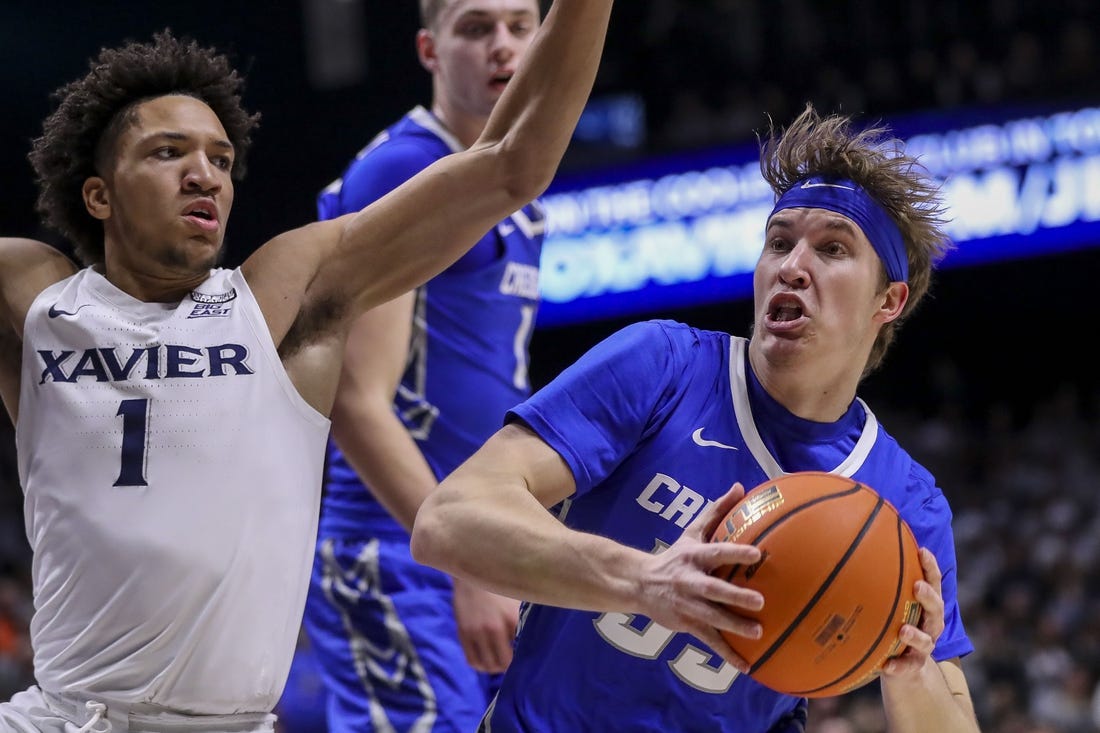 No. 12 Xavier edges Creighton for 10th straight win