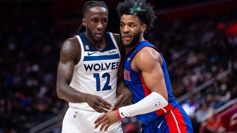 Jan 11, 2023; Detroit, Michigan, USA; Minnesota Timberwolves forward Taurean Prince (12) and Detroit Pistons forward Saddiq Bey (41) battle for position before the ball is inbounded in the second quarter at Little Caesars Arena. Mandatory Credit: Allison Farrand-USA TODAY Sports