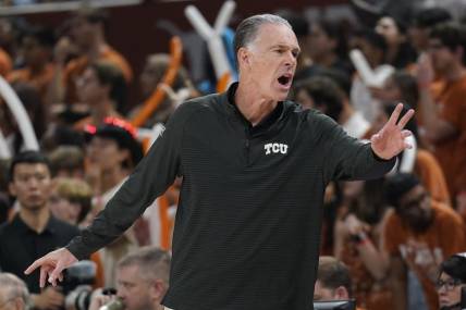 Jan 11, 2023; Austin, Texas, USA; Texas Christian Horned Frogs head coach Jamie Dixon signals to players during the first half against the Texas Longhorns at Moody Center. Mandatory Credit: Scott Wachter-USA TODAY Sports