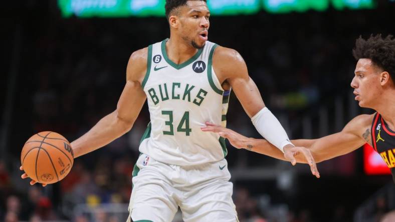 Jan 11, 2023; Atlanta, Georgia, USA; Milwaukee Bucks forward Giannis Antetokounmpo (34) dribbles against the Atlanta Hawks in the second half at State Farm Arena. Mandatory Credit: Brett Davis-USA TODAY Sports