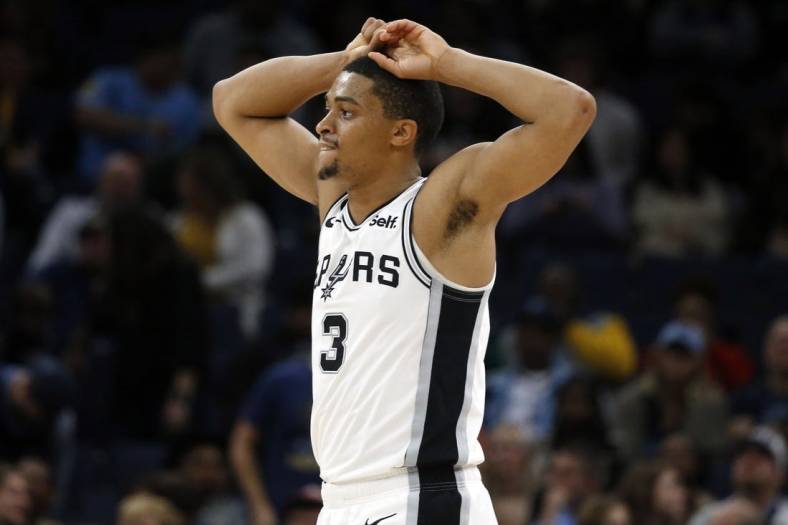 Jan 11, 2023; Memphis, Tennessee, USA; San Antonio Spurs forward Keldon Johnson (3) reacts after a foul call during the second half against the Memphis Grizzlies at FedExForum. Mandatory Credit: Petre Thomas-USA TODAY Sports