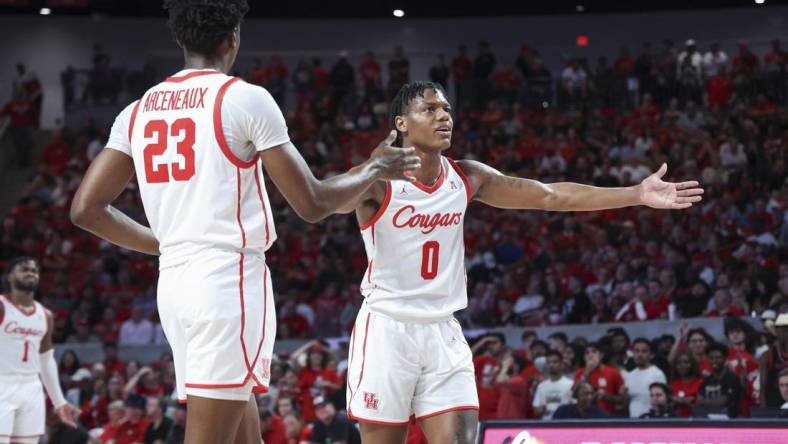 Jan 11, 2023; Houston, Texas, USA; Houston Cougars guard Marcus Sasser (0) during the game against the South Florida Bulls at Fertitta Center. Mandatory Credit: Troy Taormina-USA TODAY Sports