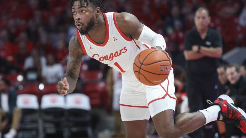 Jan 11, 2023; Houston, Texas, USA; Houston Cougars guard Jamal Shead (1) in action during the game against the South Florida Bulls at Fertitta Center. Mandatory Credit: Troy Taormina-USA TODAY Sports