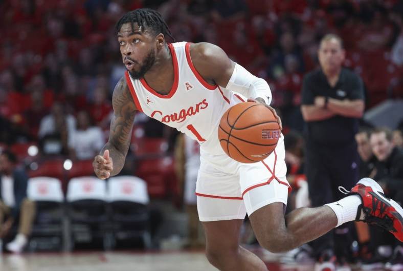 Jan 11, 2023; Houston, Texas, USA; Houston Cougars guard Jamal Shead (1) in action during the game against the South Florida Bulls at Fertitta Center. Mandatory Credit: Troy Taormina-USA TODAY Sports