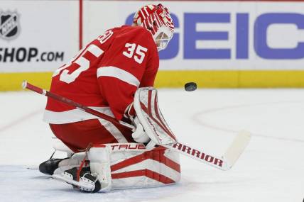 Jan 12, 2023; Detroit, Michigan, USA; Detroit Red Wings goaltender Ville Husso (35) makes the save in the first period against the Toronto Maple Leafs at Little Caesars Arena. Mandatory Credit: Rick Osentoski-USA TODAY Sports