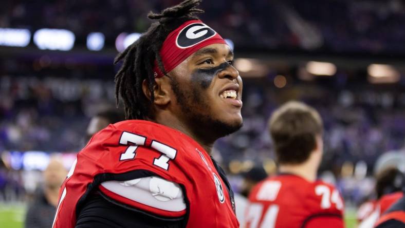 Jan 9, 2023; Inglewood, CA, USA; Georgia Bulldogs offensive lineman Devin Willock (77) against the TCU Horned Frogs during the CFP national championship game at SoFi Stadium. Mandatory Credit: Mark J. Rebilas-USA TODAY Sports