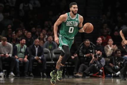 Jan 12, 2023; Brooklyn, New York, USA;  Boston Celtics forward Jayson Tatum (0) brings the ball up court in the first quarter against the Brooklyn Nets at Barclays Center. Mandatory Credit: Wendell Cruz-USA TODAY Sports