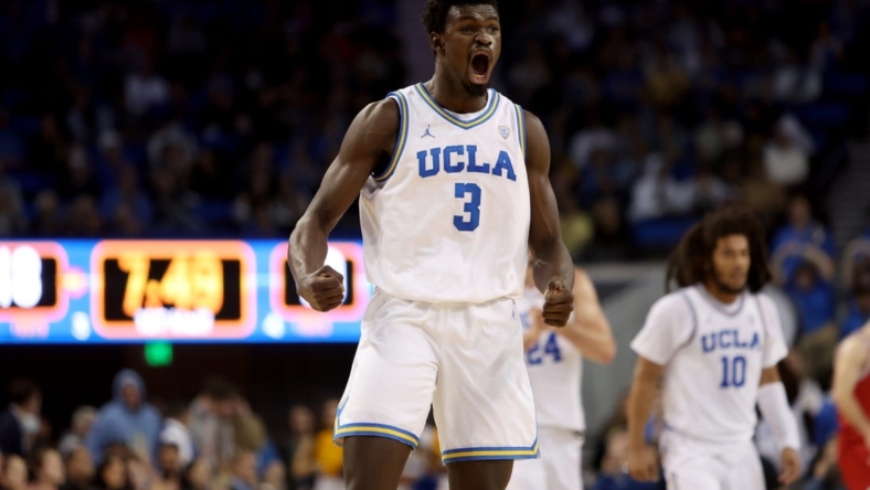 Jan 12, 2023; Los Angeles, California, USA;  UCLA Bruins forward Adem Bona (3) reacts after a dunk during the first half against the Utah Utes at Pauley Pavilion presented by Wescom. Mandatory Credit: Kiyoshi Mio-USA TODAY Sports