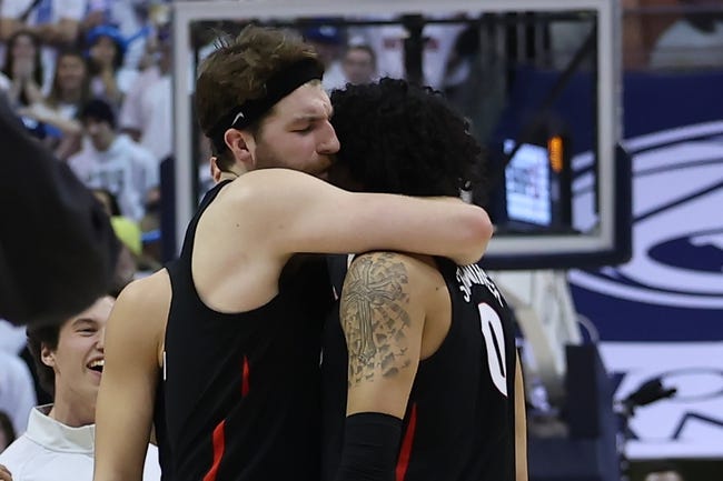 Jan 12, 2023; Provo, Utah, USA; Gonzaga Bulldogs forward Drew Timme (left) and guard Julian Strawther (right) hug after a win against the Brigham Young Cougars at Marriott Center. Mandatory Credit: Rob Gray-USA TODAY Sports