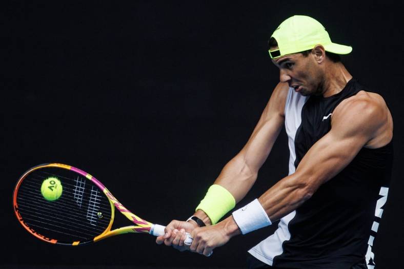 Jan 13, 2023; Melbourne, Victoria, Australia; Rafael Nadal of Spain hits a shot during a practice session on Rod Laver Arena  at Melbourne Park. Mandatory Credit: Mike Frey-USA TODAY Sports