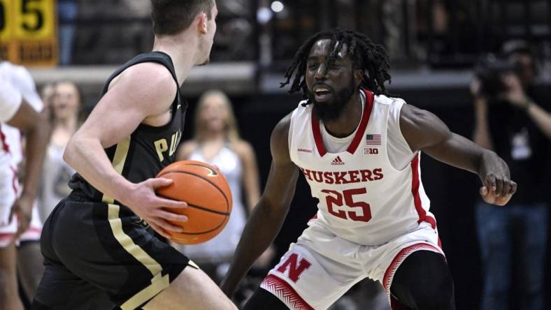 Jan 13, 2023; West Lafayette, Indiana, USA;  Nebraska Cornhuskers guard Emmanuel Bandoumel (25) defends against Purdue Boilermakers guard Braden Smith (3) during the first half at Mackey Arena. Mandatory Credit: Marc Lebryk-USA TODAY Sports