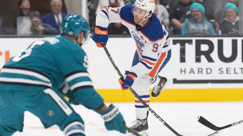 Jan 13, 2023; San Jose, California, USA;  Edmonton Oilers center Connor McDavid (97) shoots the puck during the first period against the San Jose Sharks at SAP Center at San Jose. Mandatory Credit: Stan Szeto-USA TODAY Sports