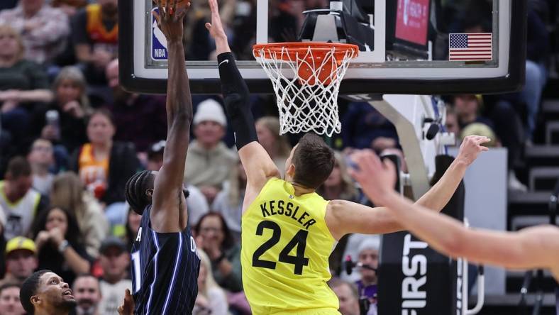 Jan 13, 2023; Salt Lake City, Utah, USA; Utah Jazz center Walker Kessler (24) blocks the shot of Orlando Magic center Mo Bamba (11) in the fourth quarter at Vivint Arena. Mandatory Credit: Rob Gray-USA TODAY Sports