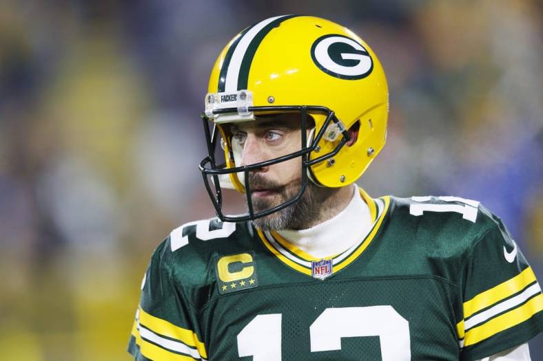 Jan 8, 2023; Green Bay, Wisconsin, USA;  Green Bay Packers quarterback Aaron Rodgers (12) during warmups prior to the game against the Detroit Lions at Lambeau Field. Mandatory Credit: Jeff Hanisch-USA TODAY Sports