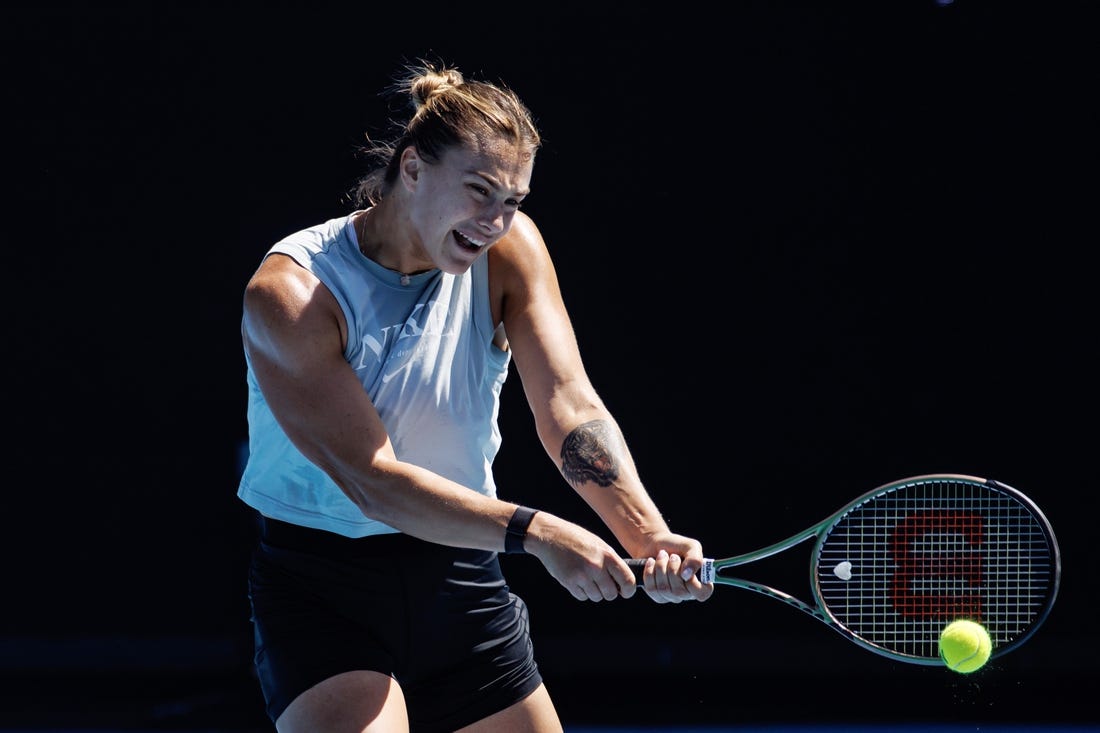 Jan 14, 2023; Melbourne, Victoria, Australia;  Aryna Sabalenka of Belarus hits a shot during a practice session at Kia Arena at Melbourne Park. Mandatory Credit: Mike Frey-USA TODAY Sports