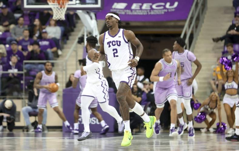 Jan 14, 2023; Fort Worth, Texas, USA;  TCU Horned Frogs forward Emanuel Miller (2) reacts after scoring during the second half against the Kansas State Wildcats at Ed and Rae Schollmaier Arena. Mandatory Credit: Kevin Jairaj-USA TODAY Sports