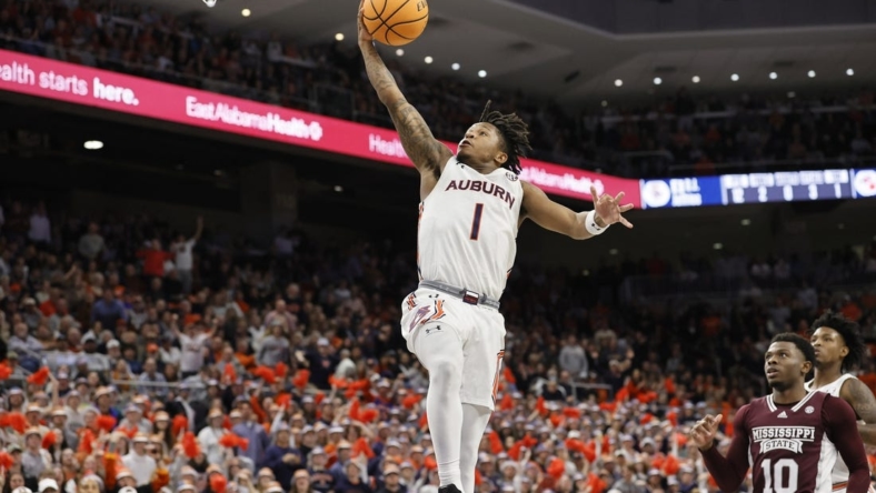 Jan 14, 2023; Auburn, Alabama, USA;  Auburn Tigers guard Wendell Green Jr. (1) goes for a layup against the Mississippi State Bulldogs during the second half at Neville Arena. Mandatory Credit: John Reed-USA TODAY Sports