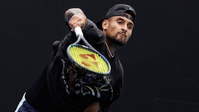 Jan 15, 2023; Melbourne, Victoria, Australia; Nick Kyrgios of Australia hits a shot during a practice session on court 16 at Melbourne Park. Mandatory Credit: Mike Frey-USA TODAY Sports