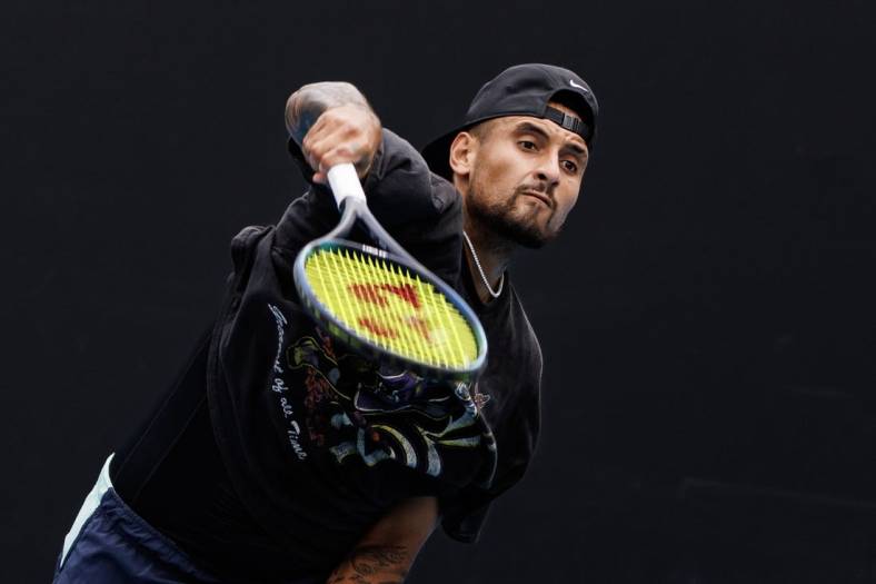 Jan 15, 2023; Melbourne, Victoria, Australia; Nick Kyrgios of Australia hits a shot during a practice session on court 16 at Melbourne Park. Mandatory Credit: Mike Frey-USA TODAY Sports