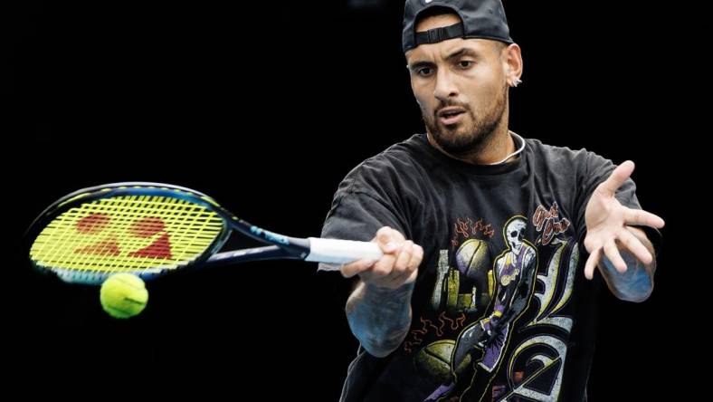 Jan 15, 2023; Melbourne, Victoria, Australia; Nick Kyrgios of Australia hits a shot during a practice session on court 16 at Melbourne Park. Mandatory Credit: Mike Frey-USA TODAY Sports