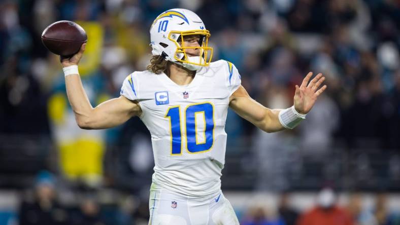 Jan 14, 2023; Jacksonville, Florida, USA; Los Angeles Chargers quarterback Justin Herbert (10) against the Jacksonville Jaguars during a wild card playoff game at TIAA Bank Field. Mandatory Credit: Mark J. Rebilas-USA TODAY Sports