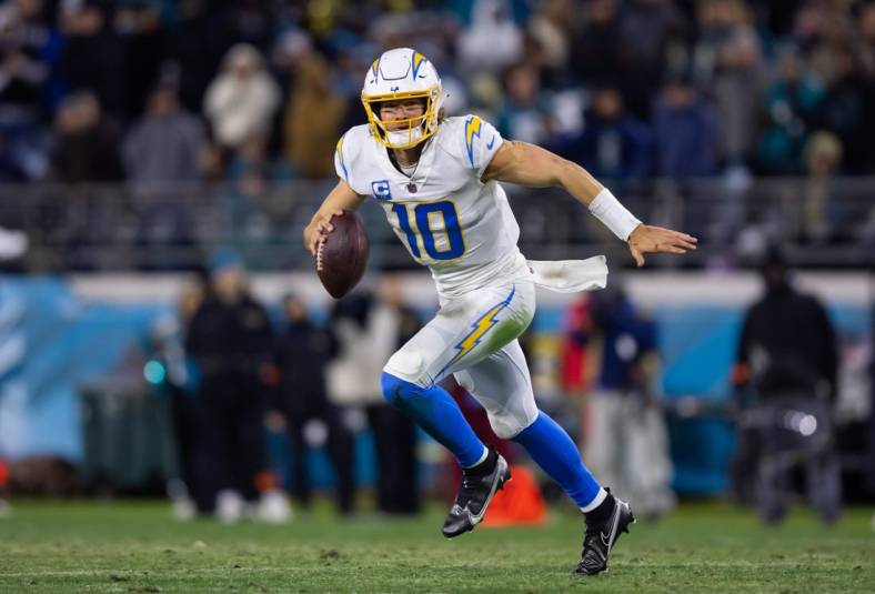 Jan 14, 2023; Jacksonville, Florida, USA; Los Angeles Chargers quarterback Justin Herbert (10) against the Jacksonville Jaguars during a wild card playoff game at TIAA Bank Field. Mandatory Credit: Mark J. Rebilas-USA TODAY Sports