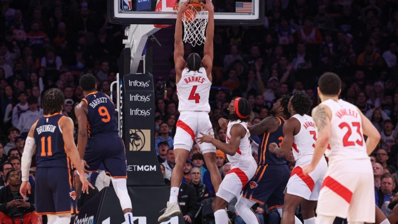 Jan 16, 2023; New York, New York, USA; Toronto Raptors forward Scottie Barnes (4) dunks the ball during overtime against the New York Knicks at Madison Square Garden. Mandatory Credit: Vincent Carchietta-USA TODAY Sports