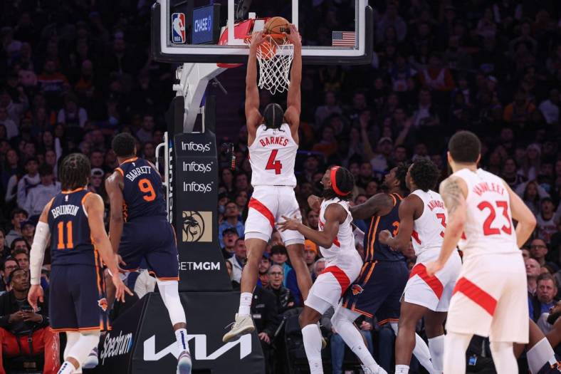 Jan 16, 2023; New York, New York, USA; Toronto Raptors forward Scottie Barnes (4) dunks the ball during overtime 
against the New York Knicks at Madison Square Garden. Mandatory Credit: Vincent Carchietta-USA TODAY Sports