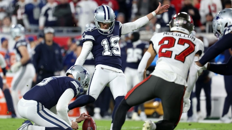 Jan 16, 2023; Tampa, Florida, USA; Dallas Cowboys place kicker Brett Maher (19) misses a point after touchdown kick in the first half during the wild card game at Raymond James Stadium. Mandatory Credit: Kim Klement-USA TODAY Sports