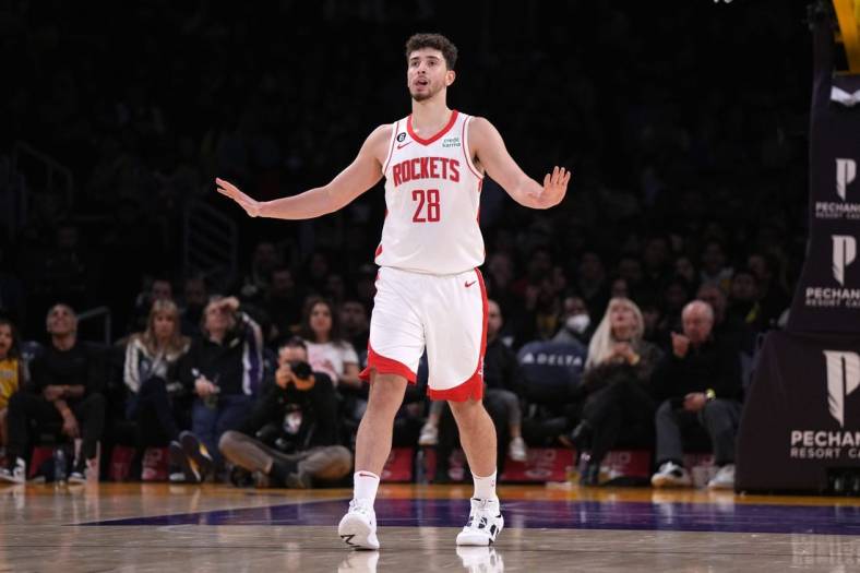 Jan 16, 2023; Los Angeles, California, USA; Houston Rockets center Alperen Sengun (28) reacts after a three-point basket against the Los Angeles Lakers in the first half at Crypto.com Arena. Mandatory Credit: Kirby Lee-USA TODAY Sports