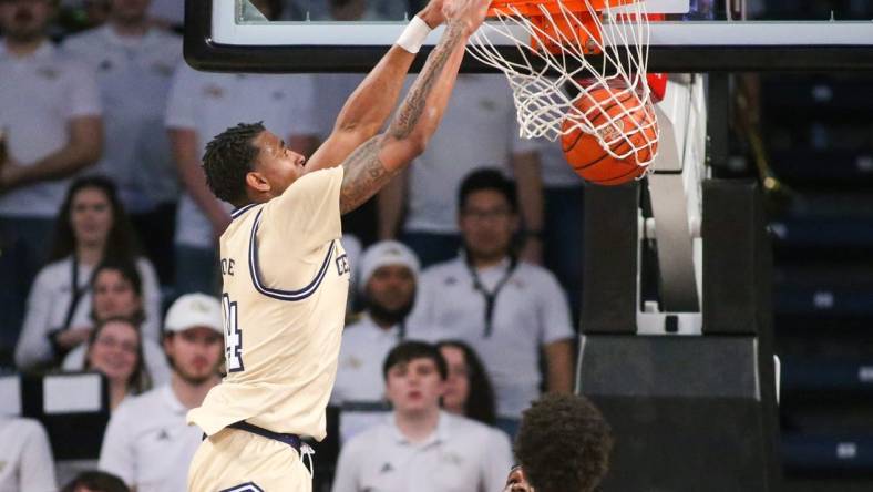 Jan 17, 2023; Atlanta, Georgia, USA; Georgia Tech Yellow Jackets forward Jalon Moore (14) dunks against the North Carolina State Wolfpack in the first half at McCamish Pavilion. Mandatory Credit: Brett Davis-USA TODAY Sports