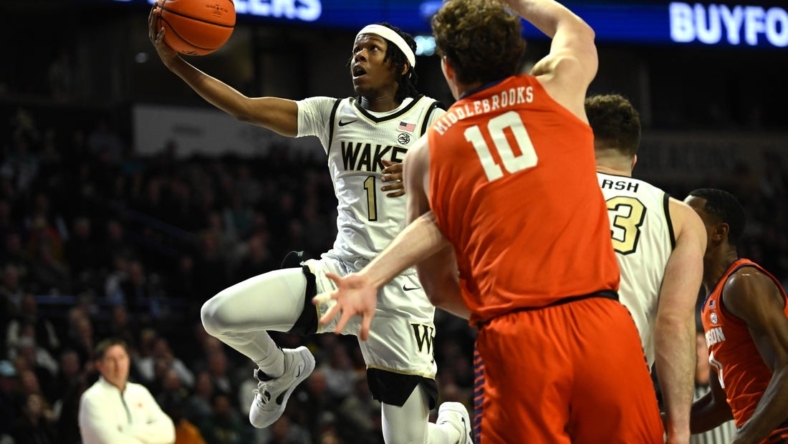 Jan 17, 2023; Winston-Salem, North Carolina, USA; Wake Forest Demon Deacons guard Tyree Appleby (1) goes to the basket past the Clemson Tigers defense during the first half at Lawrence Joel Veterans Memorial Coliseum. Mandatory Credit: William Howard-USA TODAY Sports